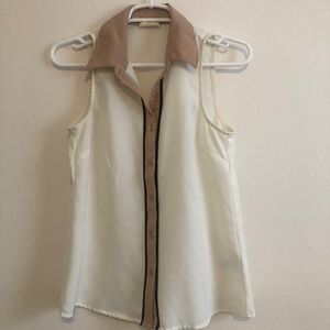 White, tan and black blouse